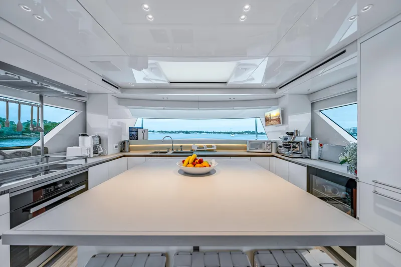Mave Yacht Photos Pics Luxurious 2020 Sanlorenzo SX88 yacht kitchen with modern appliances and panoramic windows.