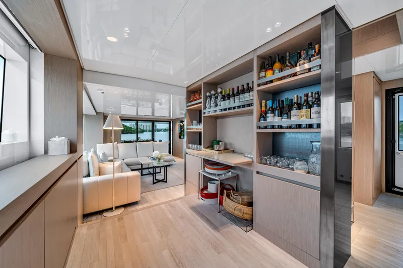 Mave Yacht Photos Pics Luxurious interior of 2020 Sanlorenzo SX88 yacht with elegant lounge and well-stocked bar.