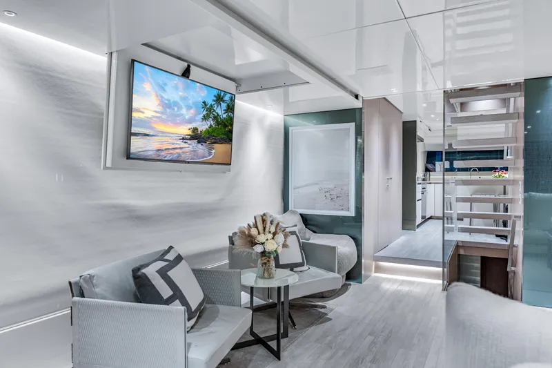 Mave Yacht Photos Pics Luxurious interior of 2020 Sanlorenzo SX88 yacht with modern decor and elegant seating area.