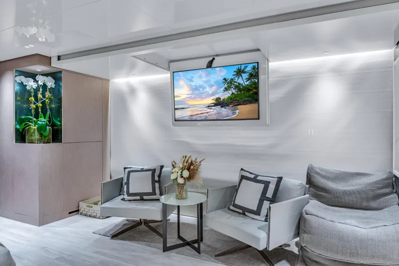 Mave Yacht Photos Pics Luxurious Sanlorenzo SX88 yacht interior with modern seating, TV, and elegant decor, 2020 model.