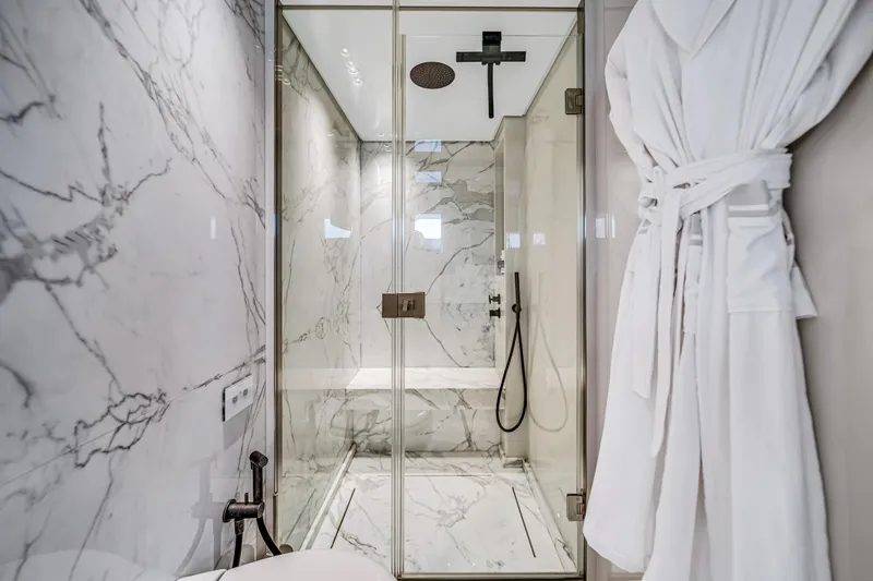 Mave Yacht Photos Pics Luxurious marble bathroom with glass shower in 2020 Sanlorenzo SX88 yacht.