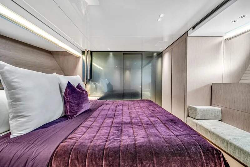 Mave Yacht Photos Pics Luxurious bedroom interior on 2020 Sanlorenzo SX88 yacht with purple bedding and modern design.