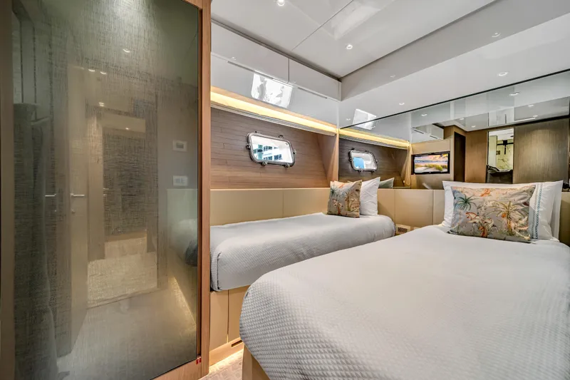 Mave Yacht Photos Pics Luxurious twin bedroom on 2020 Sanlorenzo SX88 yacht, featuring elegant decor and modern amenities.