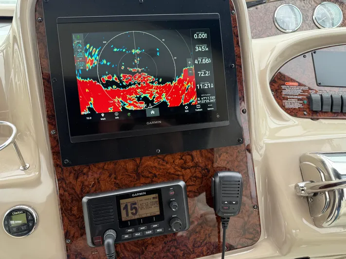  Yacht Photos Pics Control panel of 2003 Sea Ray 380 Sundancer with Garmin navigation display.