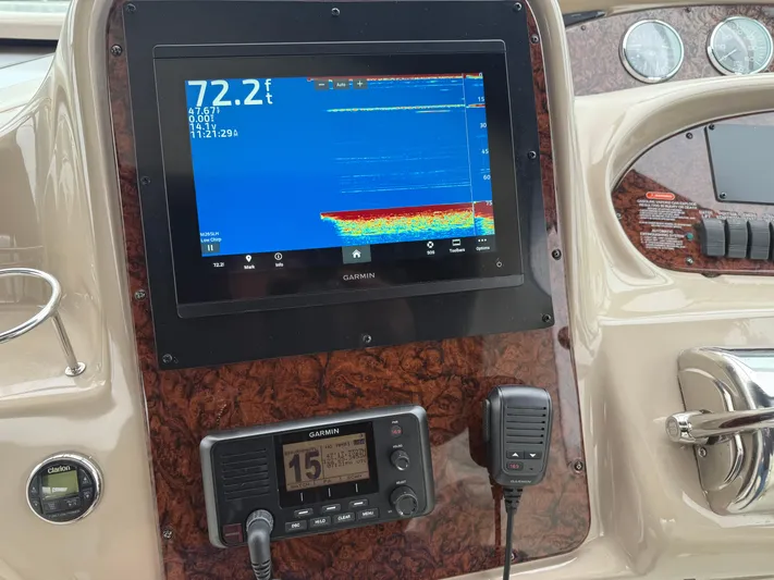  Yacht Photos Pics Control panel of a 2003 Sea Ray 380 Sundancer with Garmin navigation system.