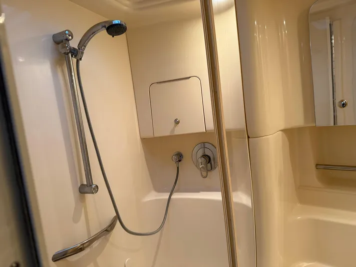  Yacht Photos Pics Shower area in 2003 Sea Ray 380 Sundancer yacht, featuring modern fixtures and sleek design.