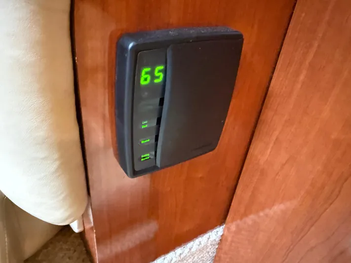  Yacht Photos Pics Thermostat on 2003 Sea Ray 380 Sundancer yacht, displaying temperature at 65 degrees.