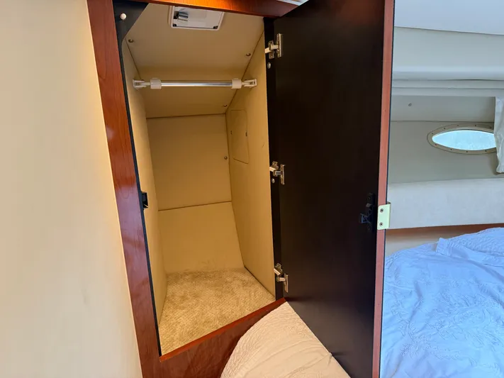  Yacht Photos Pics Open closet inside 2003 Sea Ray 380 Sundancer yacht cabin.