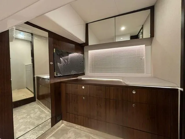 Mby Motor Boat Of The Year 2025 Yacht Photos Pics Luxurious interior of 2025 Fairline Targa 40 yacht with sleek wood cabinetry.