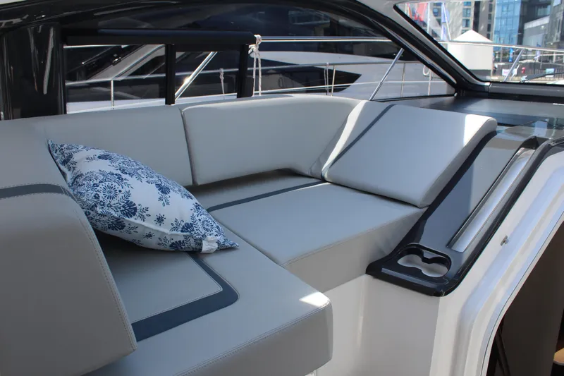 Mby Motor Boat Of The Year 2025 Yacht Photos Pics Luxurious seating area on 2025 Fairline Targa 40 yacht with decorative pillow.