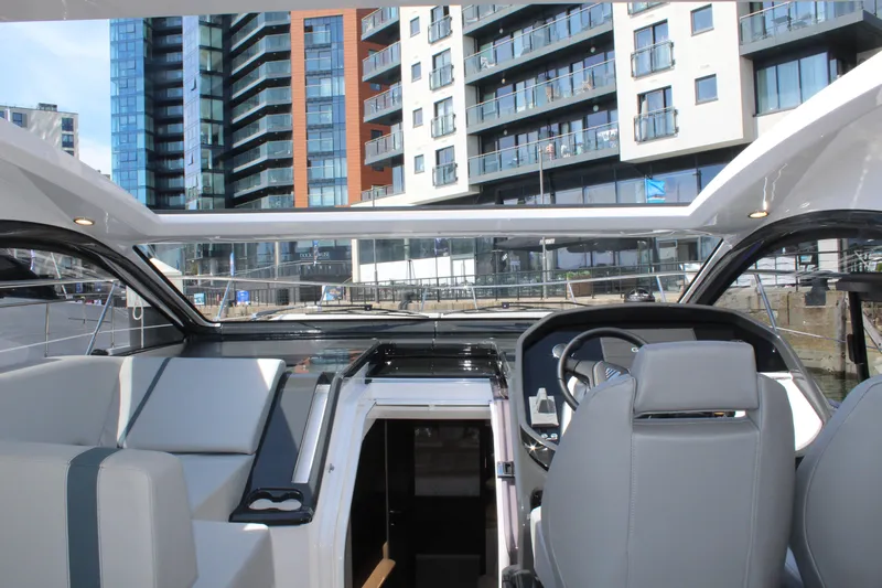Mby Motor Boat Of The Year 2025 Yacht Photos Pics Interior view of 2025 Fairline Targa 40 yacht with modern urban backdrop.