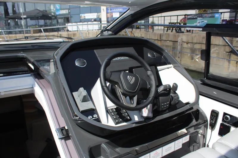 Mby Motor Boat Of The Year 2025 Yacht Photos Pics 2025 Fairline Targa 40 helm with modern controls and Garmin navigation system.