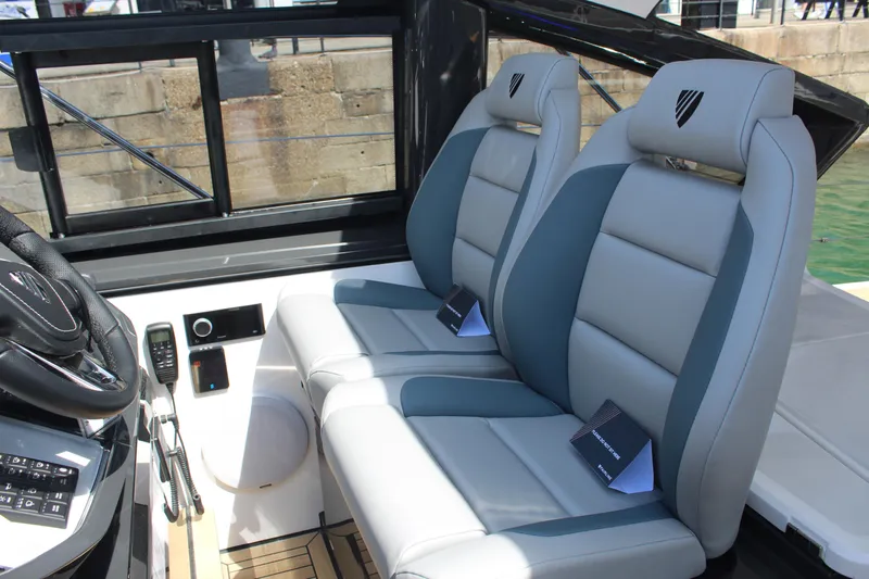 Mby Motor Boat Of The Year 2025 Yacht Photos Pics 2025 Fairline Targa 40 cockpit with luxurious seating and modern controls.