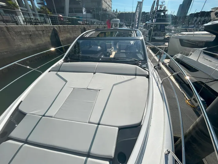 Mby Motor Boat Of The Year 2025 Yacht Photos Pics 2025 Fairline Targa 40 yacht with sleek design, docked in a marina under clear skies.