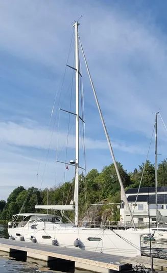 Yula Yacht Photos Pics 2024 X-Yachts Xc 47 sailboat docked, showcasing sleek design and modern features.