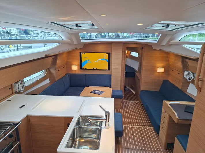 Yula Yacht Photos Pics Luxurious interior of 2024 X-Yachts Xc 47 sailboat with modern amenities and elegant design.