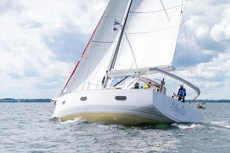 Yula Yacht Photos Pics 2024 X-Yachts Xc 47 sailing on open water under cloudy skies.