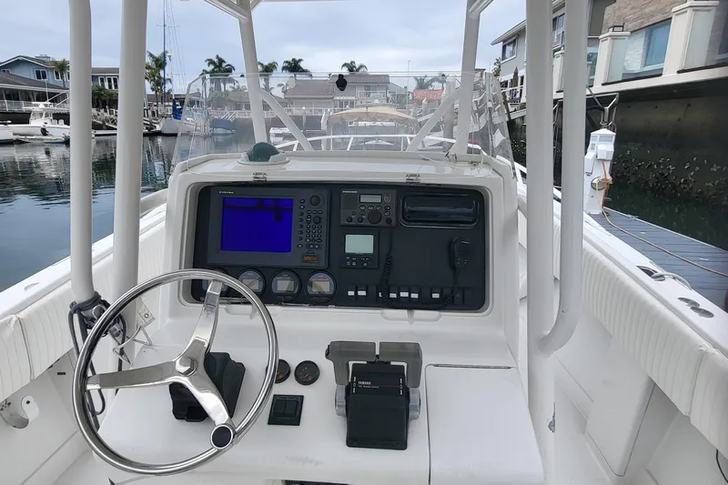 Karan Light Yacht Photos Pics 2004 Jupiter 31 Center Console boat dashboard at dock.