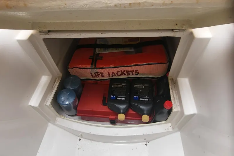 Karan Light Yacht Photos Pics Storage compartment in Jupiter 31 Center Console boat with life jackets and supplies.