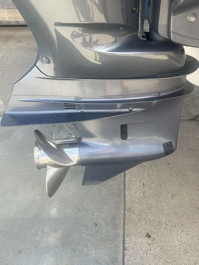  Yacht Photos Pics 2012 Grady-White 336 Canyon boat motor with propeller, close-up view.