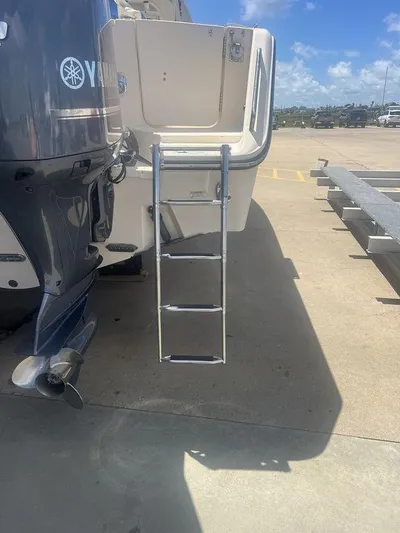  Yacht Photos Pics 2012 Grady-White 336 Canyon boat with Yamaha engine and boarding ladder.