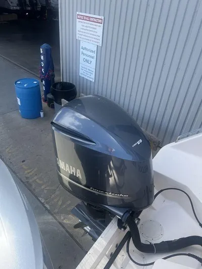  Yacht Photos Pics 2012 Grady-White 336 Canyon with Yamaha outboard motor in a marina setting.