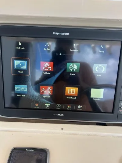  Yacht Photos Pics Raymarine display on 2012 Grady-White 336 Canyon boat, showing navigation and fishing apps.