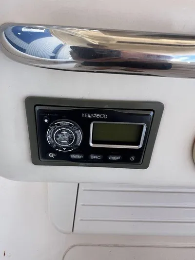  Yacht Photos Pics Kenwood stereo system on 2012 Grady-White 336 Canyon boat dashboard.