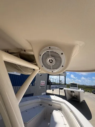  Yacht Photos Pics 2012 Grady-White 336 Canyon boat interior with speaker, showcasing sleek design and spacious seating.