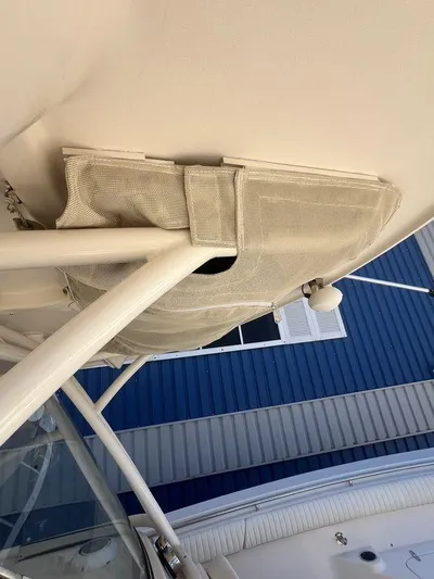  Yacht Photos Pics 2012 Grady-White 336 Canyon boat detail, featuring structural elements and canvas cover.