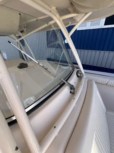  Yacht Photos Pics 2012 Grady-White 336 Canyon boat windshield and seating area.