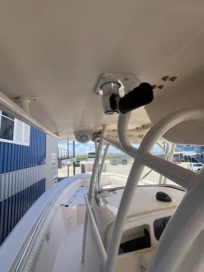  Yacht Photos Pics 2012 Grady-White 336 Canyon boat interior, featuring helm and seating area.