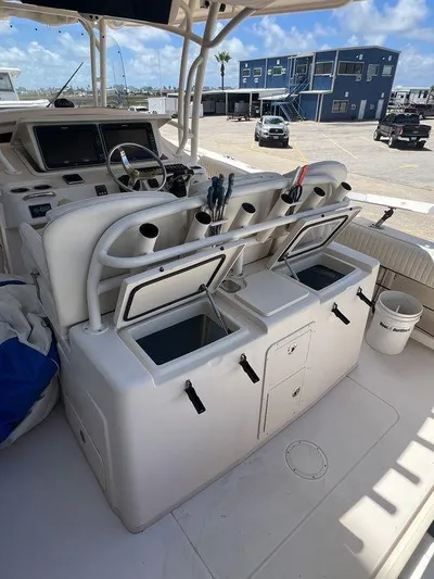  Yacht Photos Pics 2012 Grady-White 336 Canyon boat interior with fishing rod holders and storage compartments.