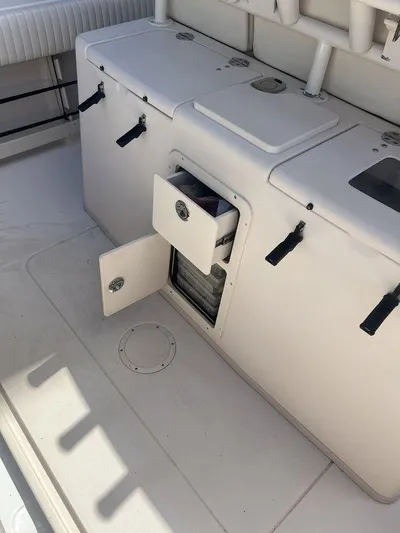  Yacht Photos Pics 2012 Grady-White 336 Canyon boat interior with storage compartments open.