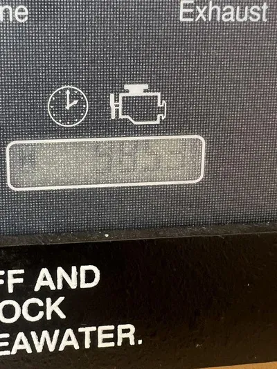  Yacht Photos Pics Close-up of a 2012 Grady-White 336 Canyon engine display panel.