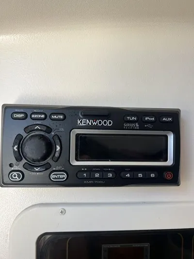  Yacht Photos Pics Kenwood audio system on 2012 Grady-White 336 Canyon boat dashboard.