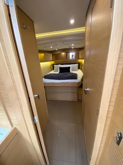  Yacht Photos Pics Luxurious cabin interior of 2017 Dufour Exclusive 56 yacht with cozy bedding.