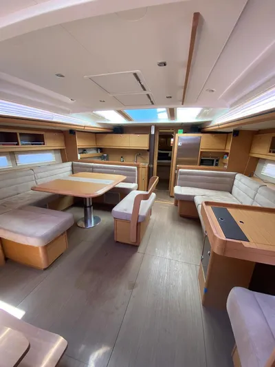  Yacht Photos Pics Luxurious interior of 2017 Dufour Exclusive 56 yacht with spacious seating and modern design.