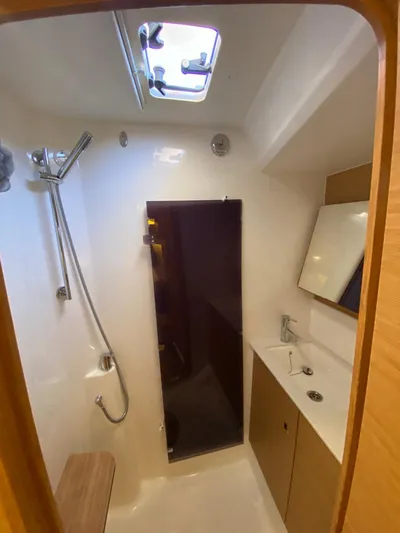  Yacht Photos Pics Bathroom interior of 2017 Dufour Exclusive 56 yacht with shower and sink.