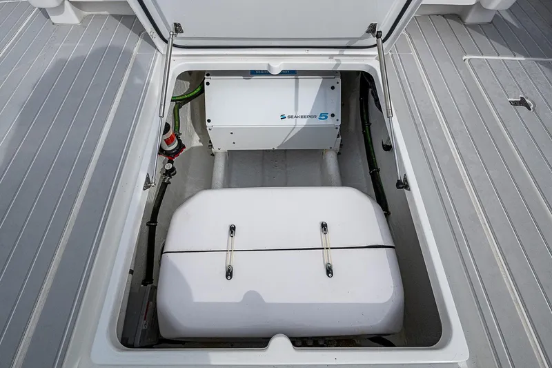  Yacht Photos Pics 2023 Intrepid 427 Nomad SE boat compartment with Seakeeper 5 stabilizer system.