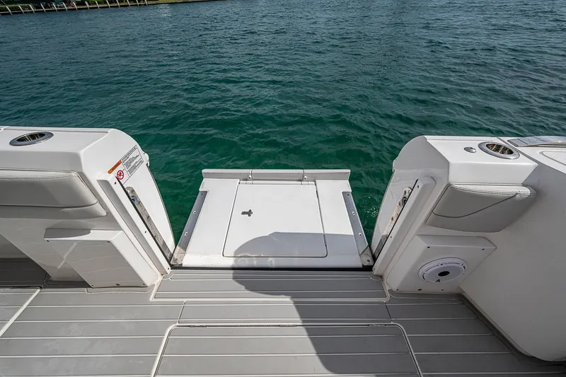 Yacht Photos Pics 2023 Intrepid 427 Nomad SE boat swim platform with open access to water.