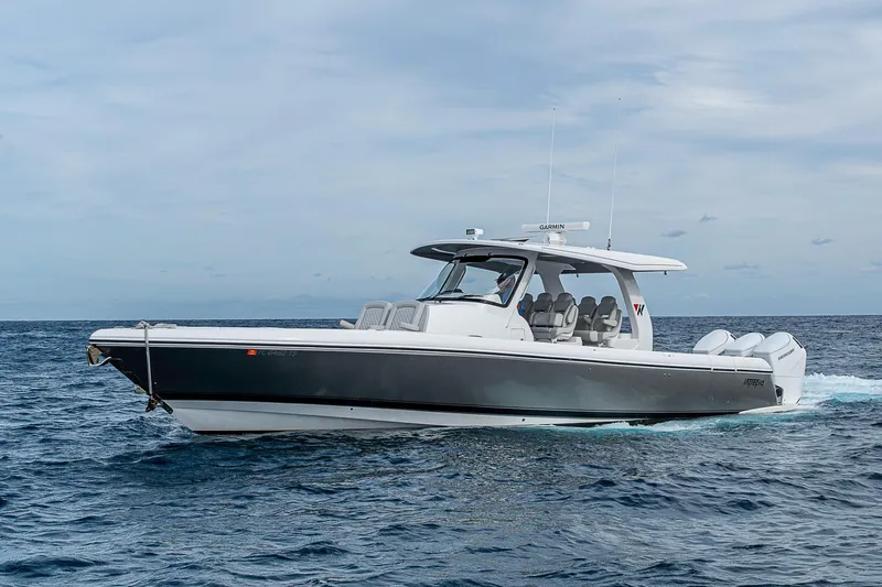  Yacht Photos Pics 2023 Intrepid 427 Nomad SE boat cruising on open water.