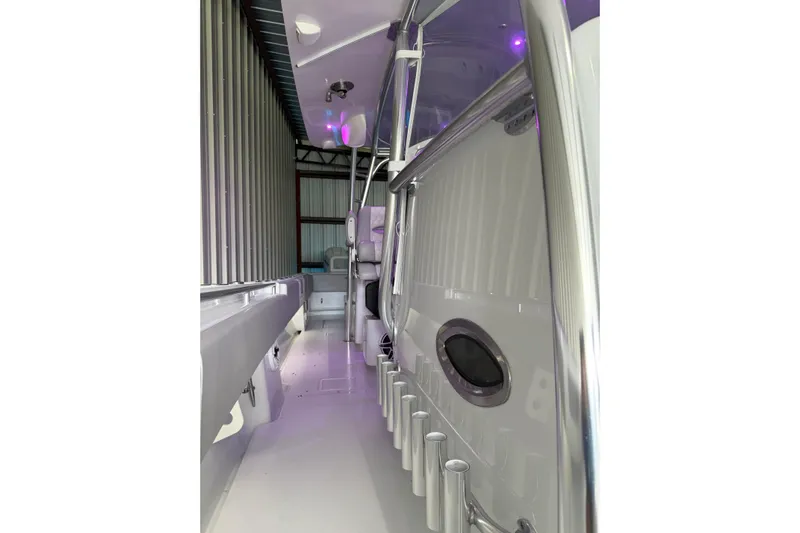  Yacht Photos Pics 2025 Contender 44 ST boat interior with sleek design and modern features.