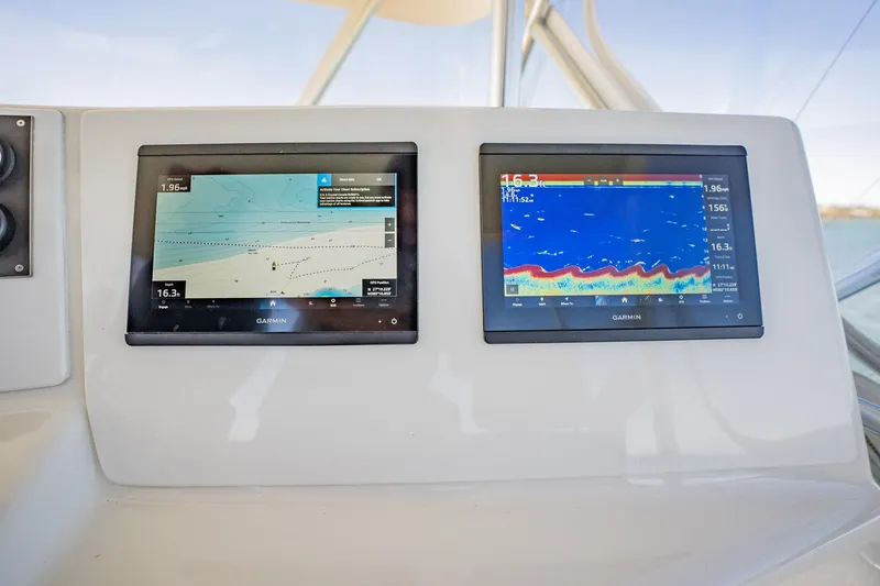 Business Yacht Photos Pics Dual Garmin marine displays on a 2001 Post 42 boat dashboard.