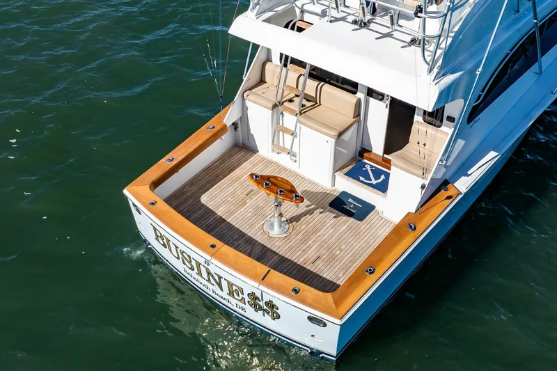 Business Yacht Photos Pics Luxury yacht "Post 42" from 2001, featuring spacious deck and seating area.