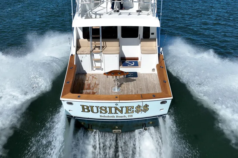 Business Yacht Photos Pics Luxury yacht "BUSINE$$" cruising on open water, Rehoboth Beach, DE.