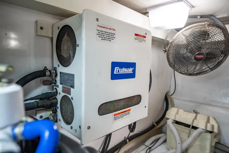 Business Yacht Photos Pics Cruisair unit in a 2001 Post 42 model, with visible fan and hoses.