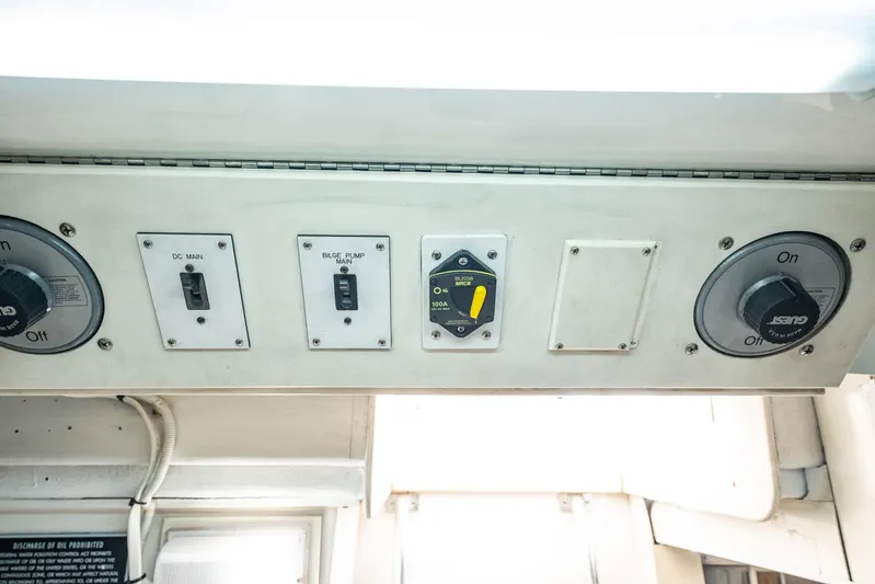 Business Yacht Photos Pics Control panel with switches and dials on a 2001 Post 42 model boat.