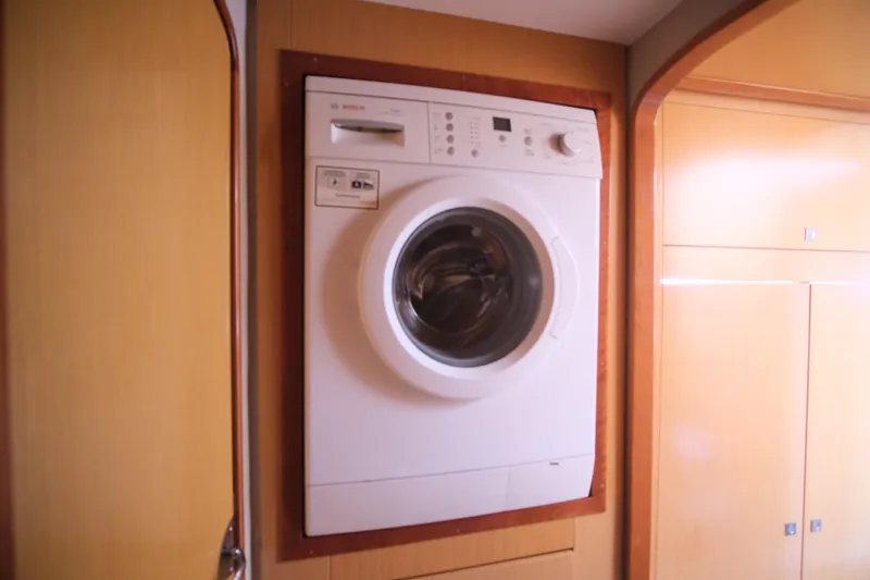 Northern Lynx Yacht Photos Pics Washing machine in 2011 Fountaine Pajot Salina 48 Evolution Maestro yacht interior.