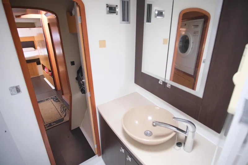 Northern Lynx Yacht Photos Pics Interior of 2011 Fountaine Pajot Salina 48 Evolution Maestro, featuring modern bathroom and hallway.